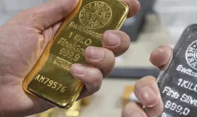 الذهب يهوي 7.5% والفضة تفقد 12%